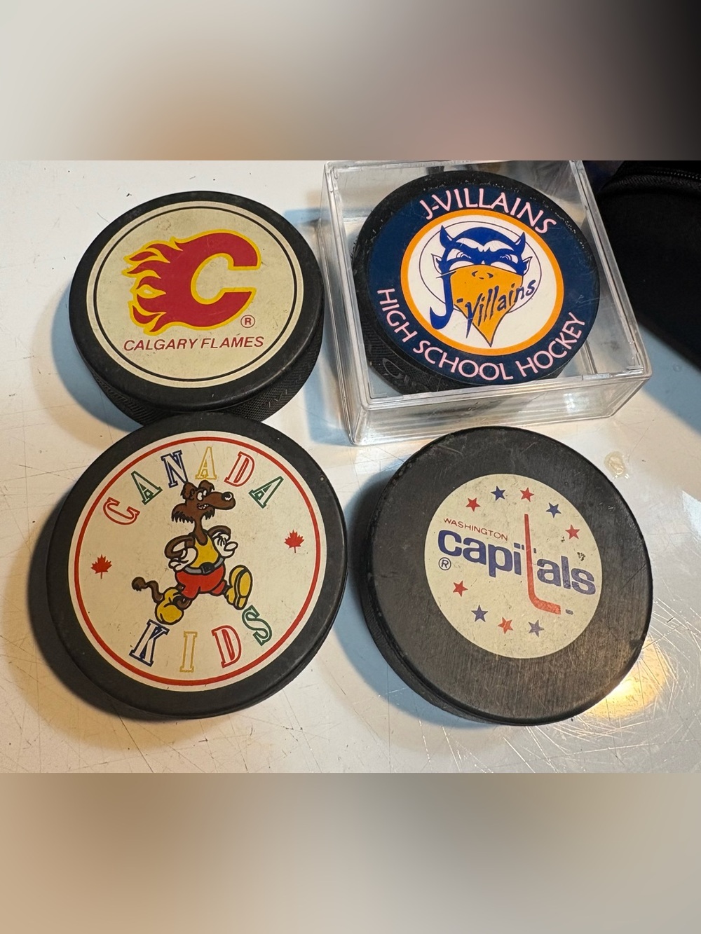 Four Vintage Hockey pucks